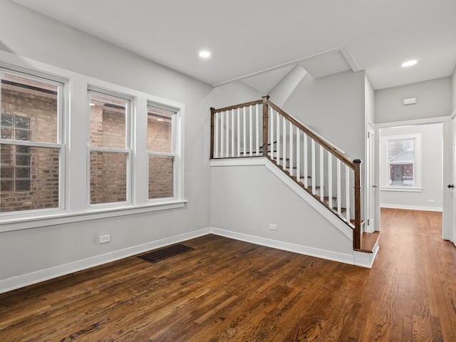 interior space featuring dark wood-type flooring