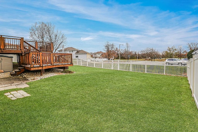 view of yard featuring a deck