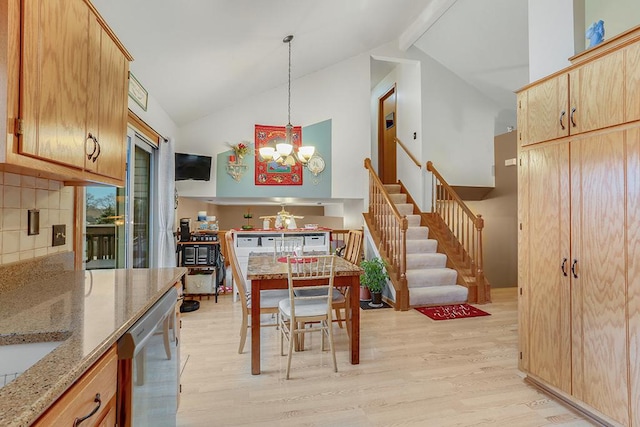 dining space featuring beam ceiling, high vaulted ceiling, an inviting chandelier, and light hardwood / wood-style flooring