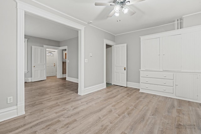 unfurnished bedroom with light hardwood / wood-style flooring and ceiling fan