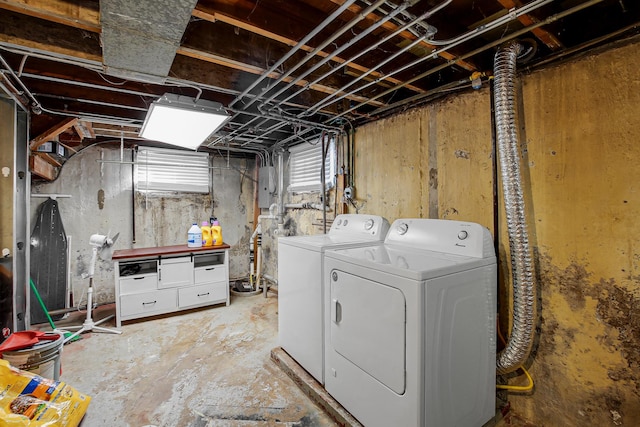 laundry area with washer and dryer and electric panel