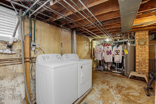 clothes washing area with independent washer and dryer and water heater