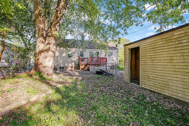 view of yard featuring a deck