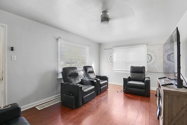 interior space with dark hardwood / wood-style floors and ceiling fan