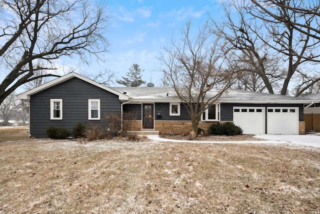 single story home with a garage