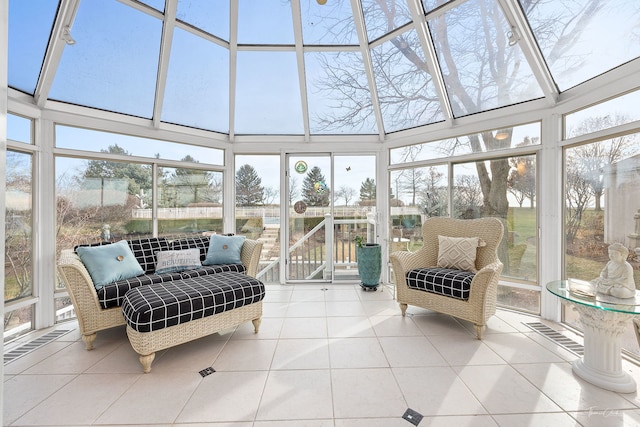 sunroom / solarium featuring a healthy amount of sunlight