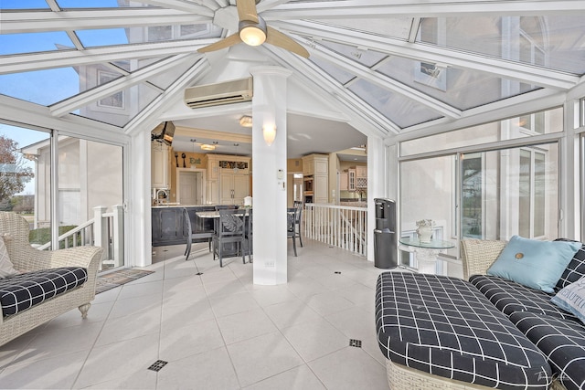 sunroom with ceiling fan and a wall mounted AC