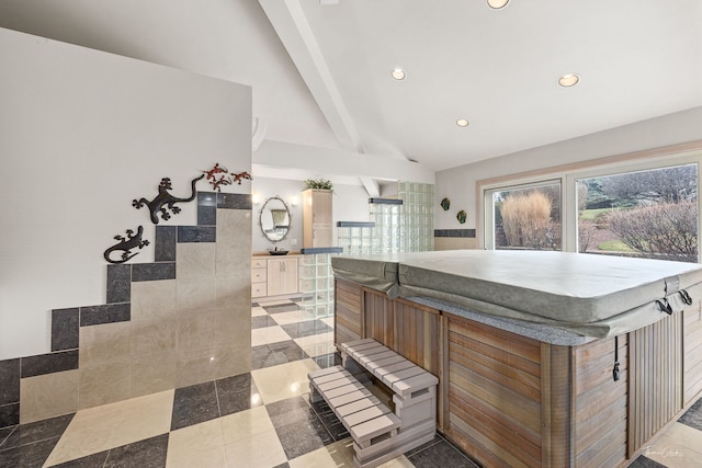 kitchen featuring lofted ceiling with beams and recessed lighting