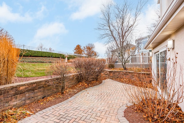 view of patio / terrace featuring fence