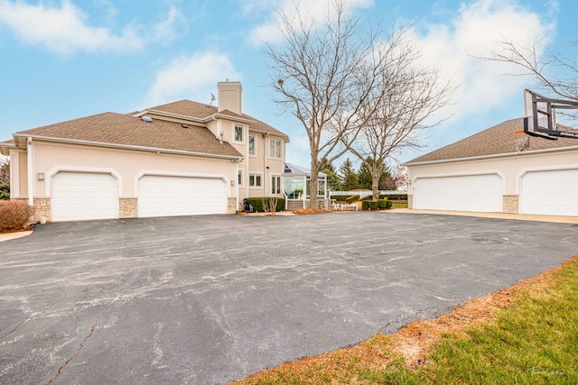 view of home's exterior with a garage