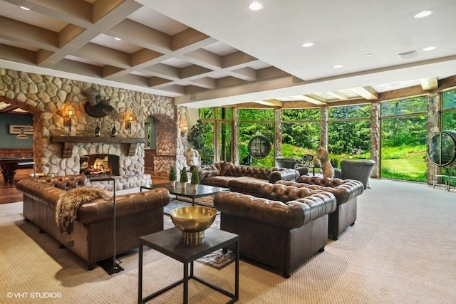 carpeted living room with a fireplace, beam ceiling, and coffered ceiling