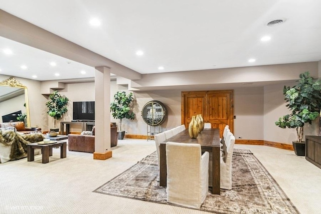 view of carpeted dining area