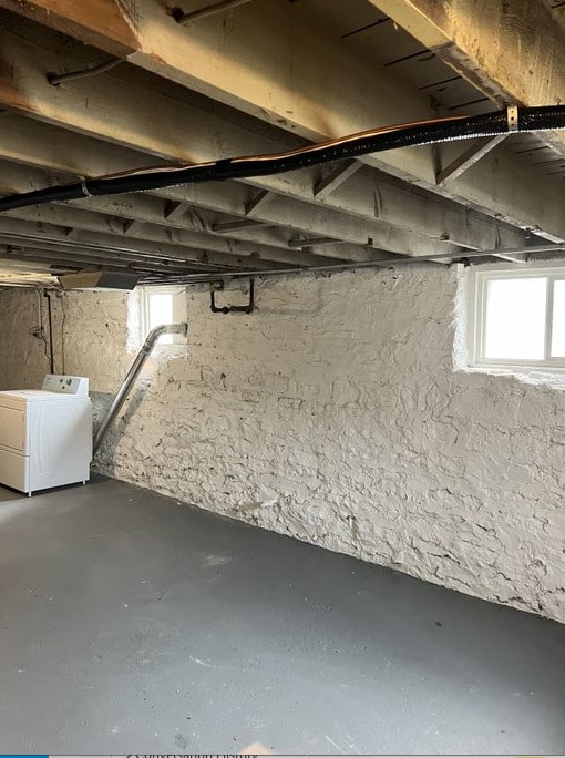 basement with washer / clothes dryer