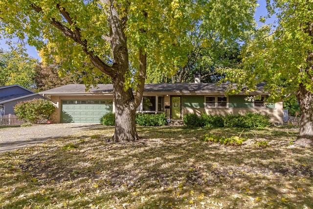 single story home with a garage