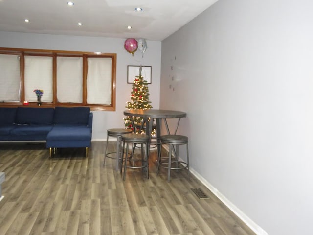 living area featuring hardwood / wood-style floors