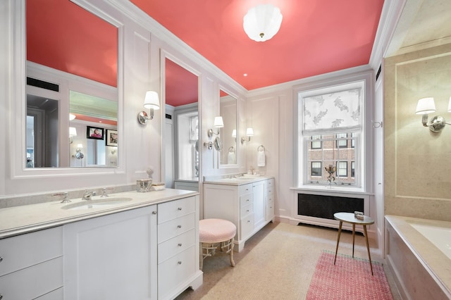 bathroom with vanity and ornamental molding