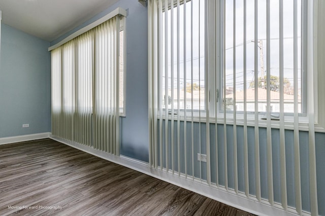 empty room featuring hardwood / wood-style flooring