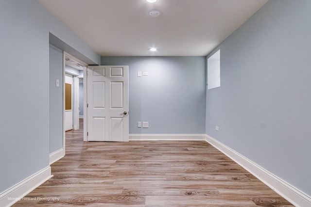 unfurnished room featuring light wood-type flooring