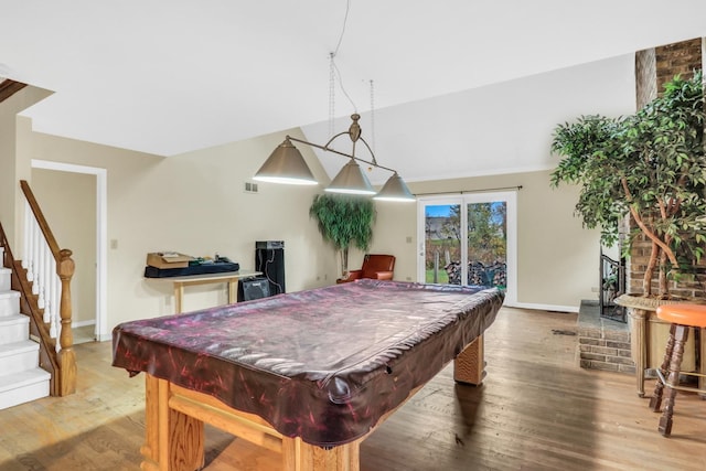 rec room featuring hardwood / wood-style flooring and billiards