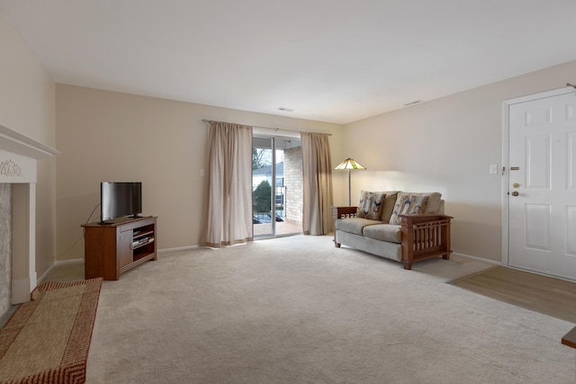 living room featuring light colored carpet