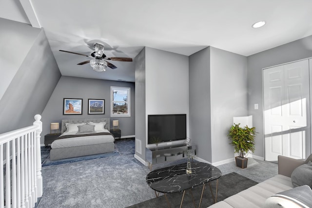 carpeted living room with ceiling fan