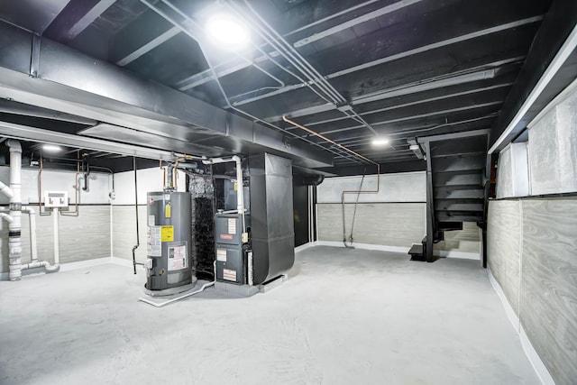 basement with heating unit and water heater