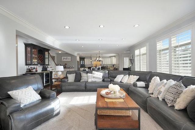 carpeted living room with crown molding