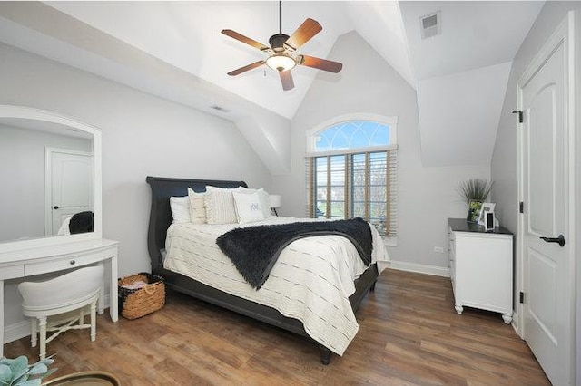 bedroom featuring ceiling fan, lofted ceiling, and dark wood-type flooring