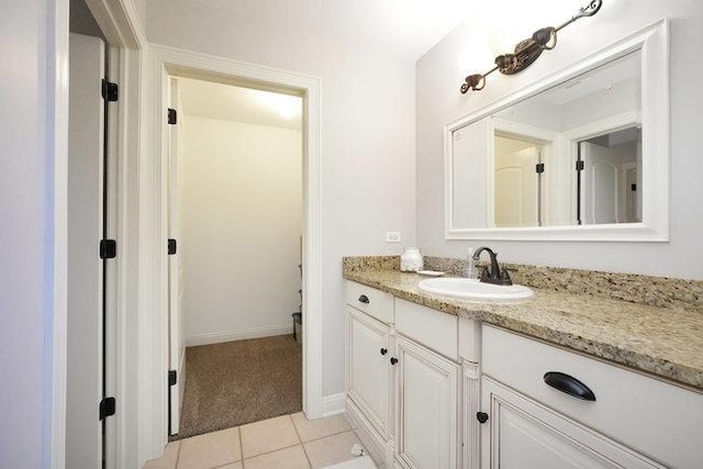 bathroom with vanity and tile patterned floors