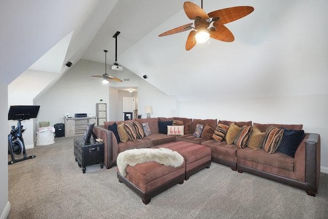 living room featuring ceiling fan, light colored carpet, and lofted ceiling