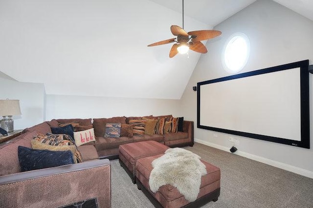 carpeted home theater with ceiling fan and lofted ceiling