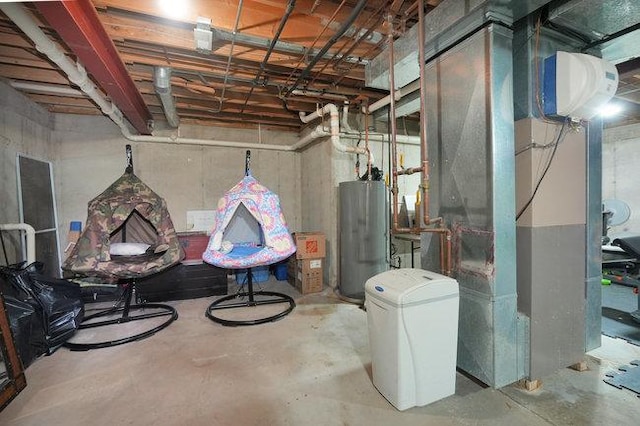 basement featuring gas water heater and heating unit