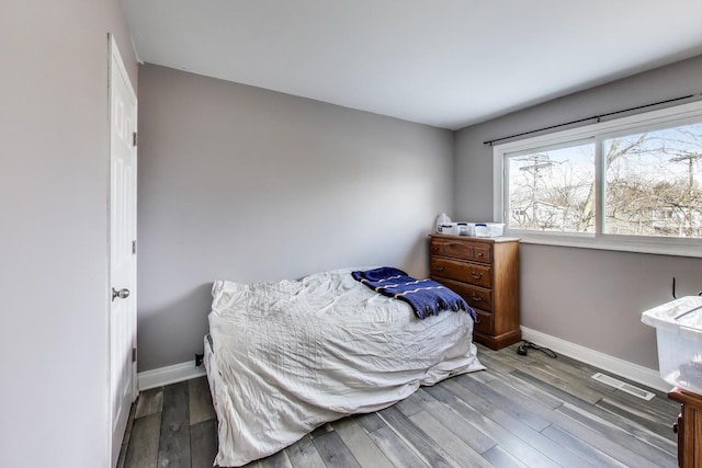 bedroom with light wood-type flooring