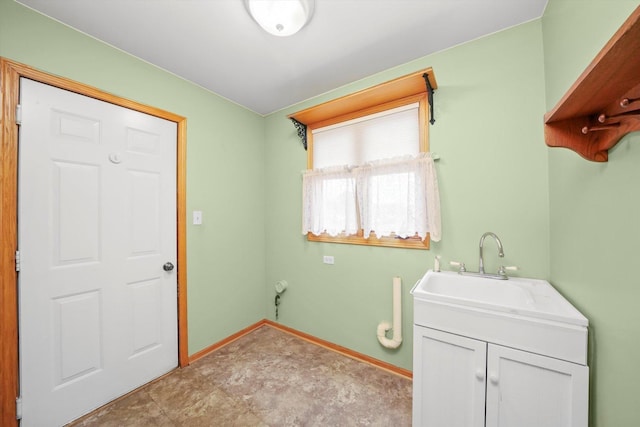 laundry area featuring sink