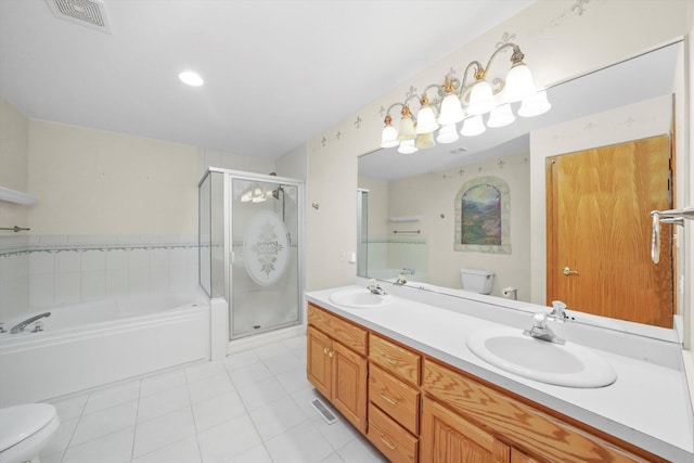 full bathroom featuring tile patterned floors, vanity, independent shower and bath, and toilet