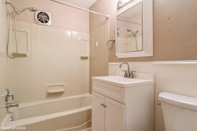 full bathroom with vanity, toilet, and shower / washtub combination