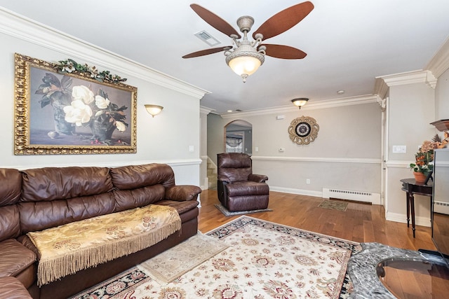 living room with a baseboard radiator, light hardwood / wood-style flooring, ceiling fan, and ornamental molding