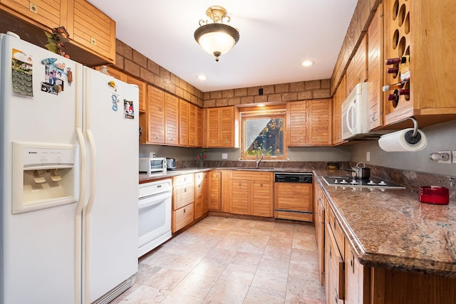 kitchen with white appliances and sink