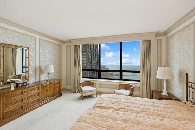 carpeted bedroom featuring a water view and crown molding