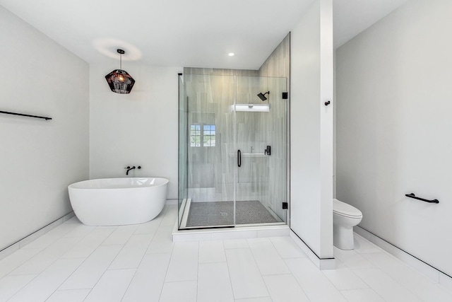 full bath featuring toilet, a soaking tub, a shower stall, and baseboards