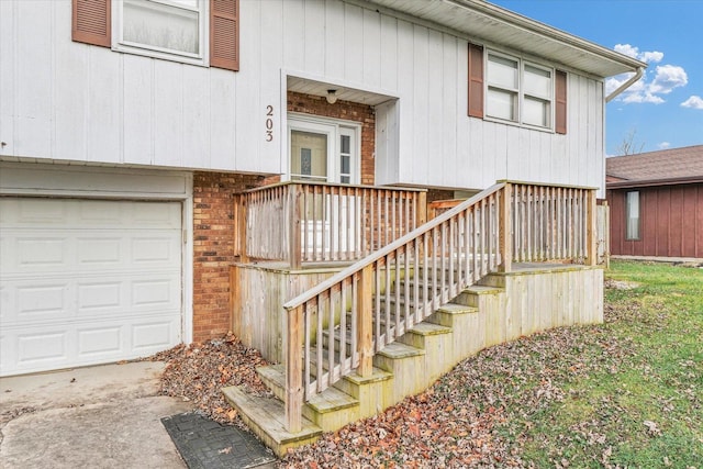 doorway to property featuring a garage