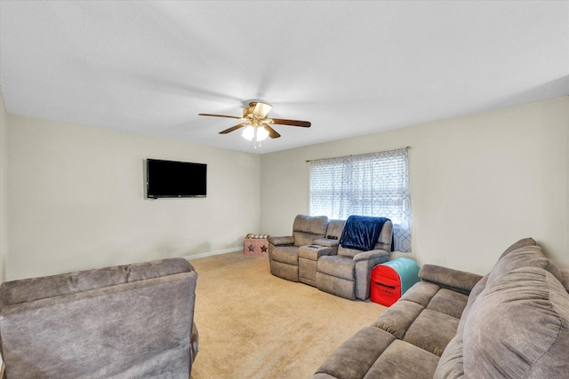 living room with carpet and ceiling fan