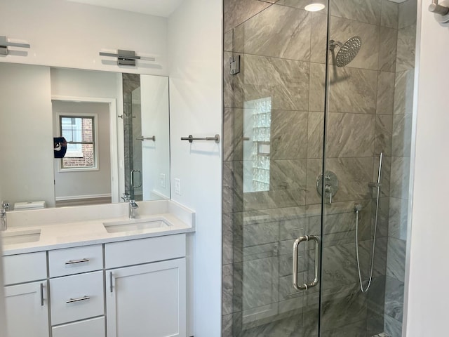 bathroom featuring vanity and walk in shower