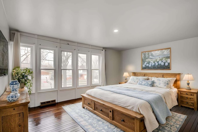 bedroom featuring dark hardwood / wood-style floors