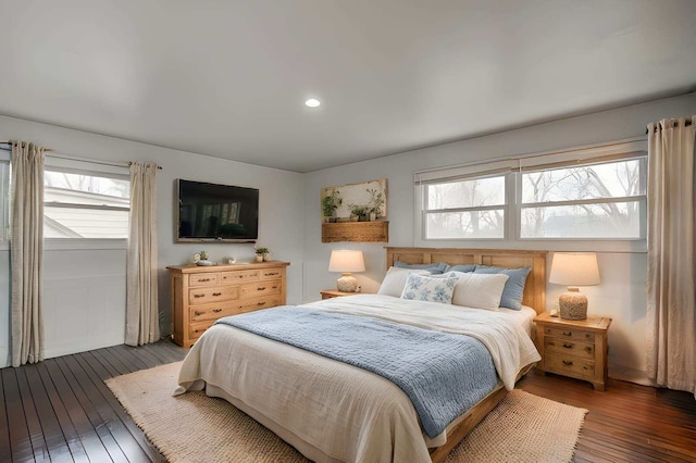 bedroom featuring dark hardwood / wood-style floors