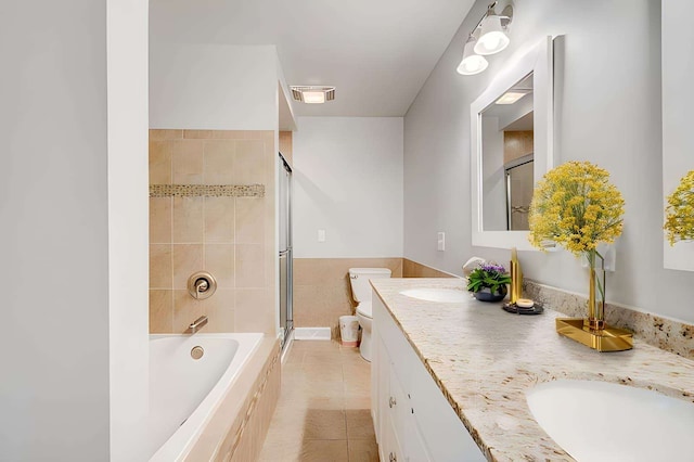 full bathroom with tile patterned flooring, vanity, toilet, and plus walk in shower