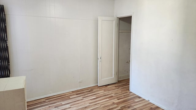 unfurnished bedroom with light hardwood / wood-style floors