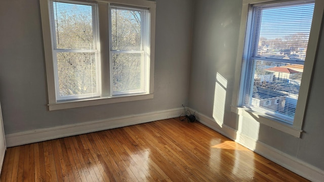 empty room featuring hardwood / wood-style floors