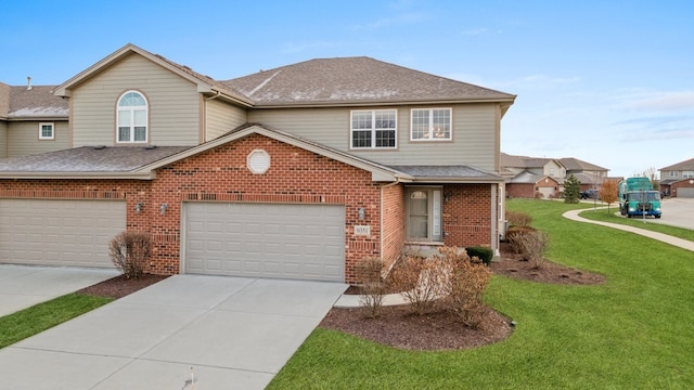 front of property with a front yard and a garage