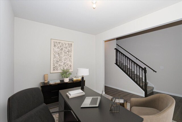 corridor featuring hardwood / wood-style flooring and separate washer and dryer